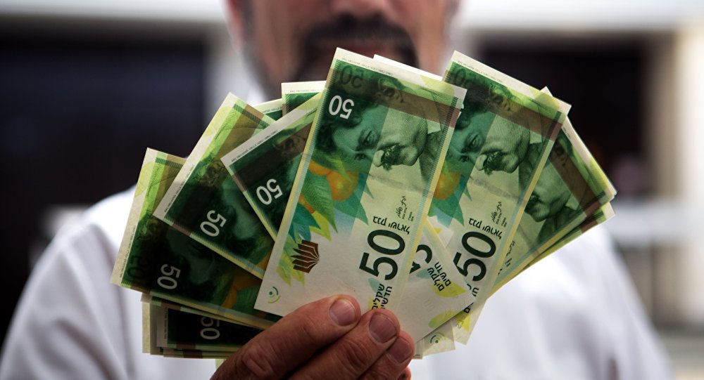 La dépréciation de la monnaie israélienne coïncide avec des tirs de dizaines de roquettes du Hezbollah sur le nord de l’entité sioniste depuis le Liban.