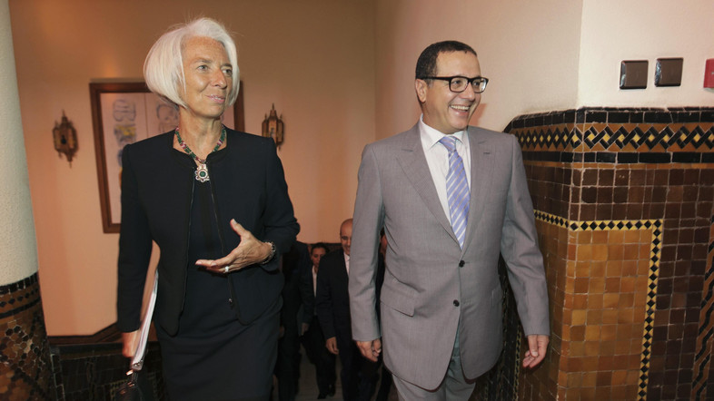 International Monetary Fund Managing Director Christine Lagarde (L) talks with Moroccan Finance Minister Mohamed Boussaid, as she arrives for a meeting at the Finance Ministry in Rabat, May 8, 2014. IMF chief Lagarde said on Thursday that Arab nations switching to democracy face chronic unemployment and must try to nurture a strong middle class to support them through their transition. REUTERS/Stringer (MOROCCO - Tags: POLITICS BUSINESS) - RTR3OBY2