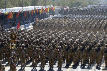 Iranian soldiers march during an annual military parade which marks Iran's eight-year war with Iraq, in the capital Tehran, on September 21, 2012. Iran proudly paraded its military hardware in Tehran under the gaze of President Mahmoud Ahmadinejad, who used the event to again defiantly lash out at the West and Israel. AFP PHOTO/ATTA KENARE (Photo credit should read ATTA KENARE/AFP/GettyImages)