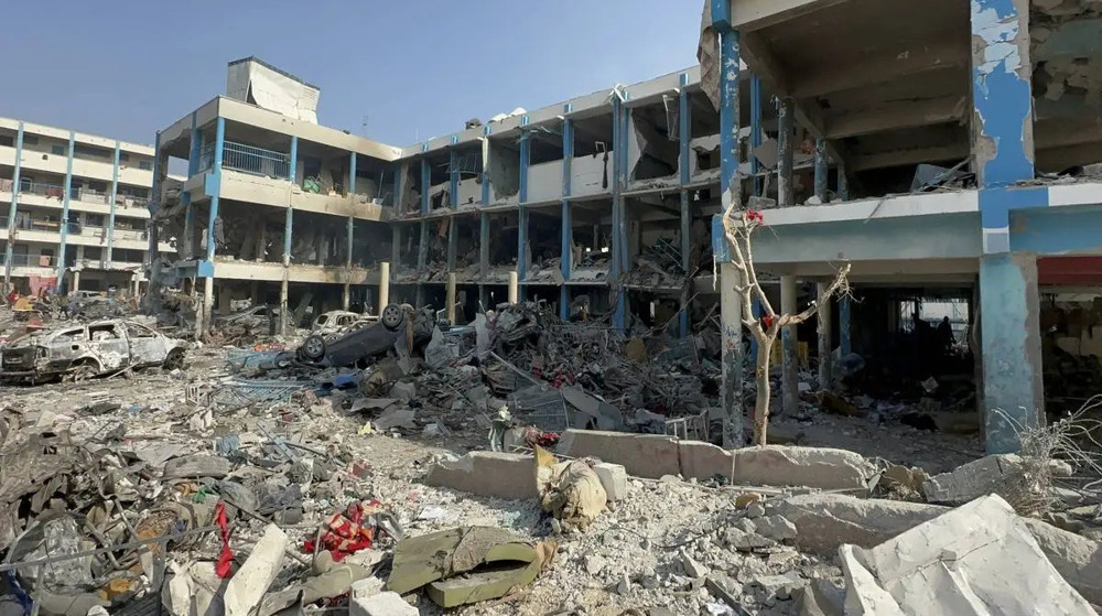 Une école affiliée à l’UNRWA a été détruite suite aux attaques israéliennes contre le camp de Jabalia, à Gaza, le 12 décembre 2023. © Anadolu